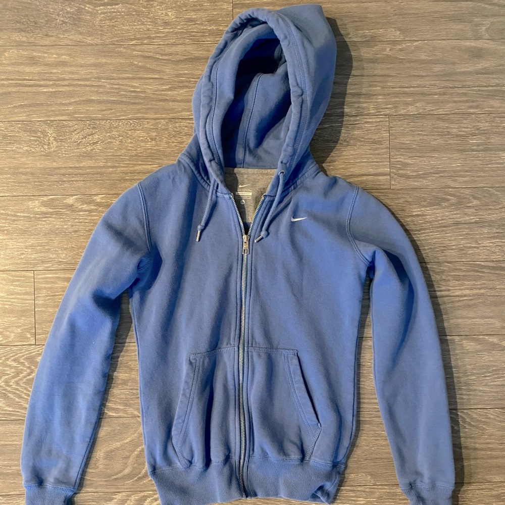 Woman’s Nike zip up.
